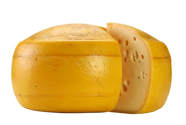 This image has an empty alt attribute; its file name is Gouda-Cheese.jpg